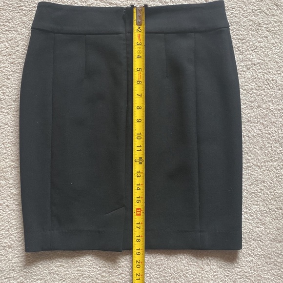 Black skirt with zippered back by “LOFT”.  Size 4 - Picture 4 of 5